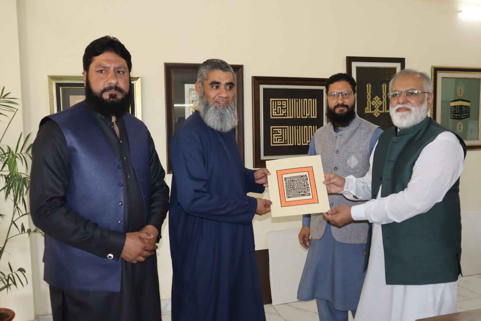 Chairman Khubaib Foundation event showcasing beautiful calligraphy art.