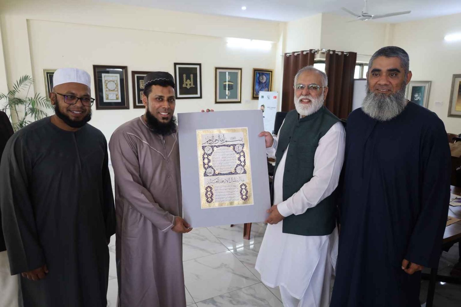 Nadeem Ahmad Khan showcasing exquisite calligraphy art in a captivating presentation.