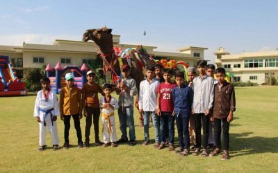 Orphan children at Khubaib Orphanage celebrate Eid with a camel for Qurban.