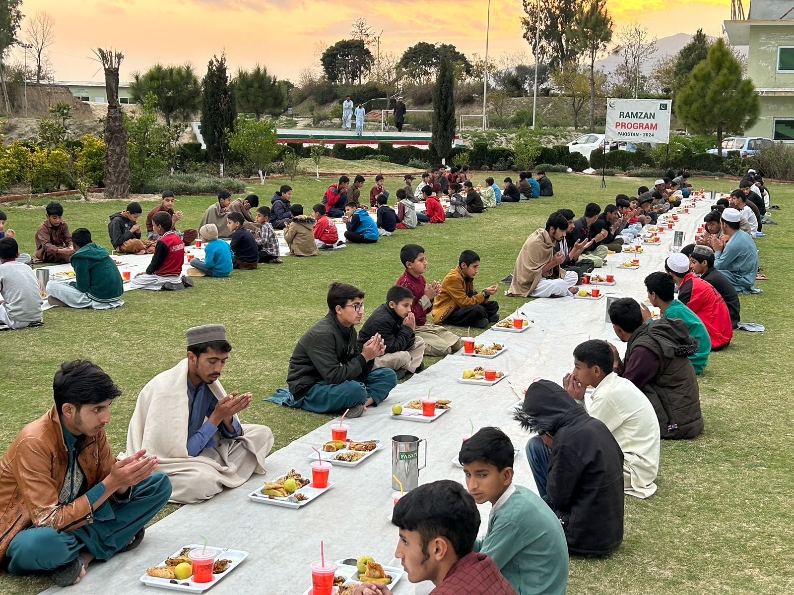 Community gathering for Ramadan iftar at Khubaib School, Haripur.