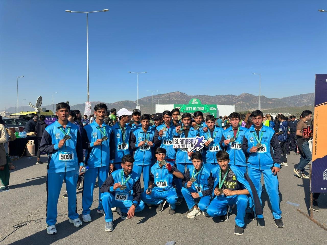 Khubaib running in the Islamabad marathon, showcasing athletic spirit and local scenery.