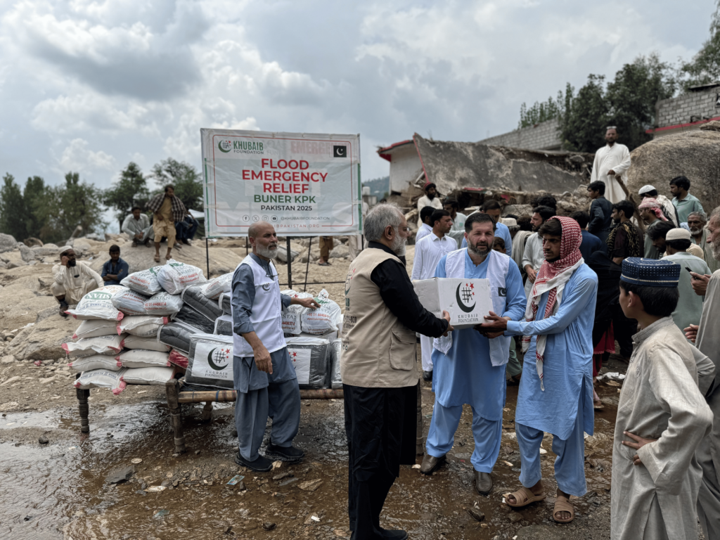 Chairman Khubaib Foundation distributing Ration and Blankets to Flood affecties in Buner