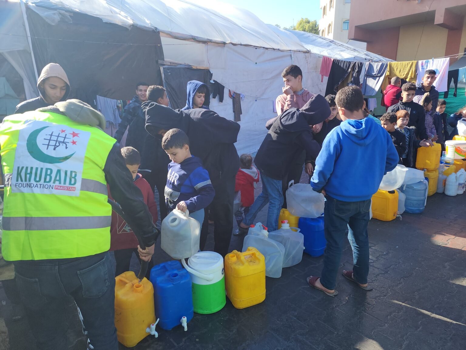 Water Distribution buy Khubaib Foundation in Gaza