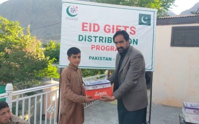 Eid gift distribution at Khubaib Orphanage in Gilgit celebrating community spirit.